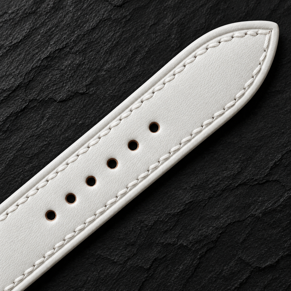 Milky White Swift Leather Watch Strap - on slate detail