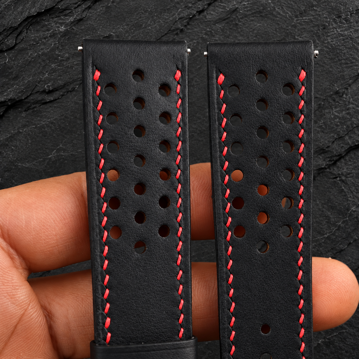 Black Through-Hole Rally Swift Leather Watch Strap - Red Stitch - through holes red stitch macro