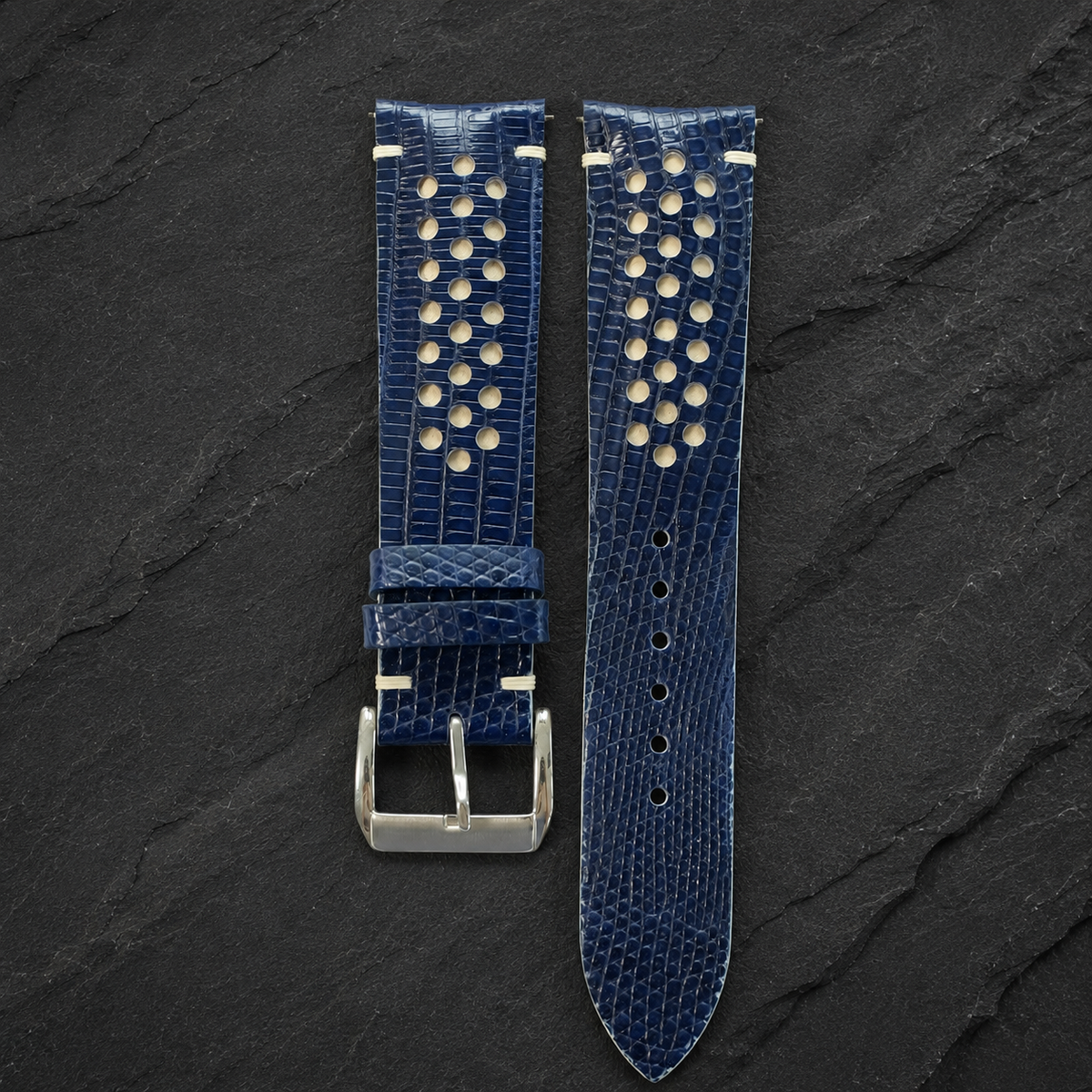 Navy and cream racing rally lizard watch strap, both halves flat lay on slate