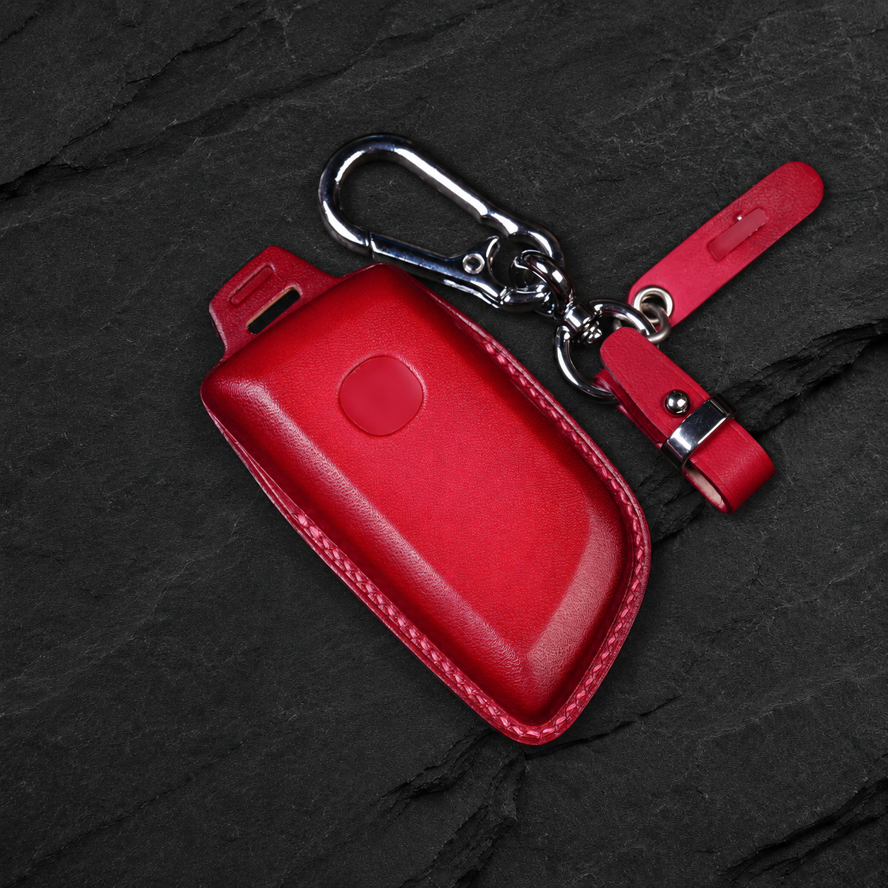 Acura MDX leather key fob cover held in hand