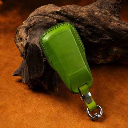 Green leather Audi key fob cover - back view on driftwood