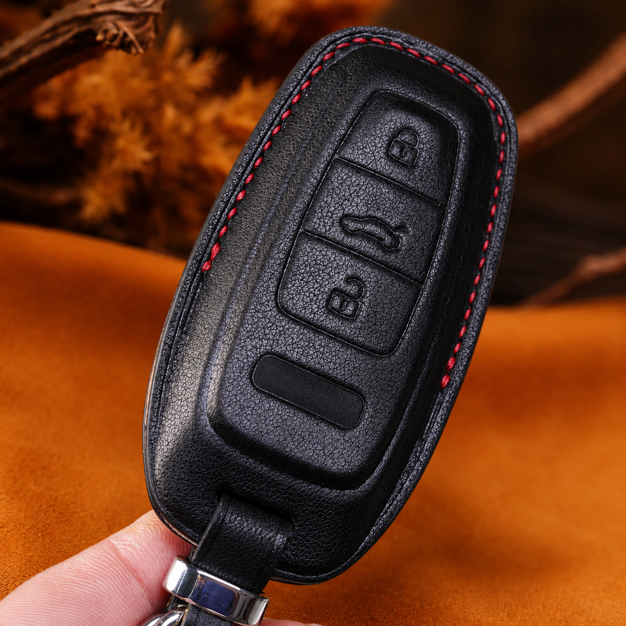 Black leather Audi e-tron key fob cover - 3-button smart key front with red stitching