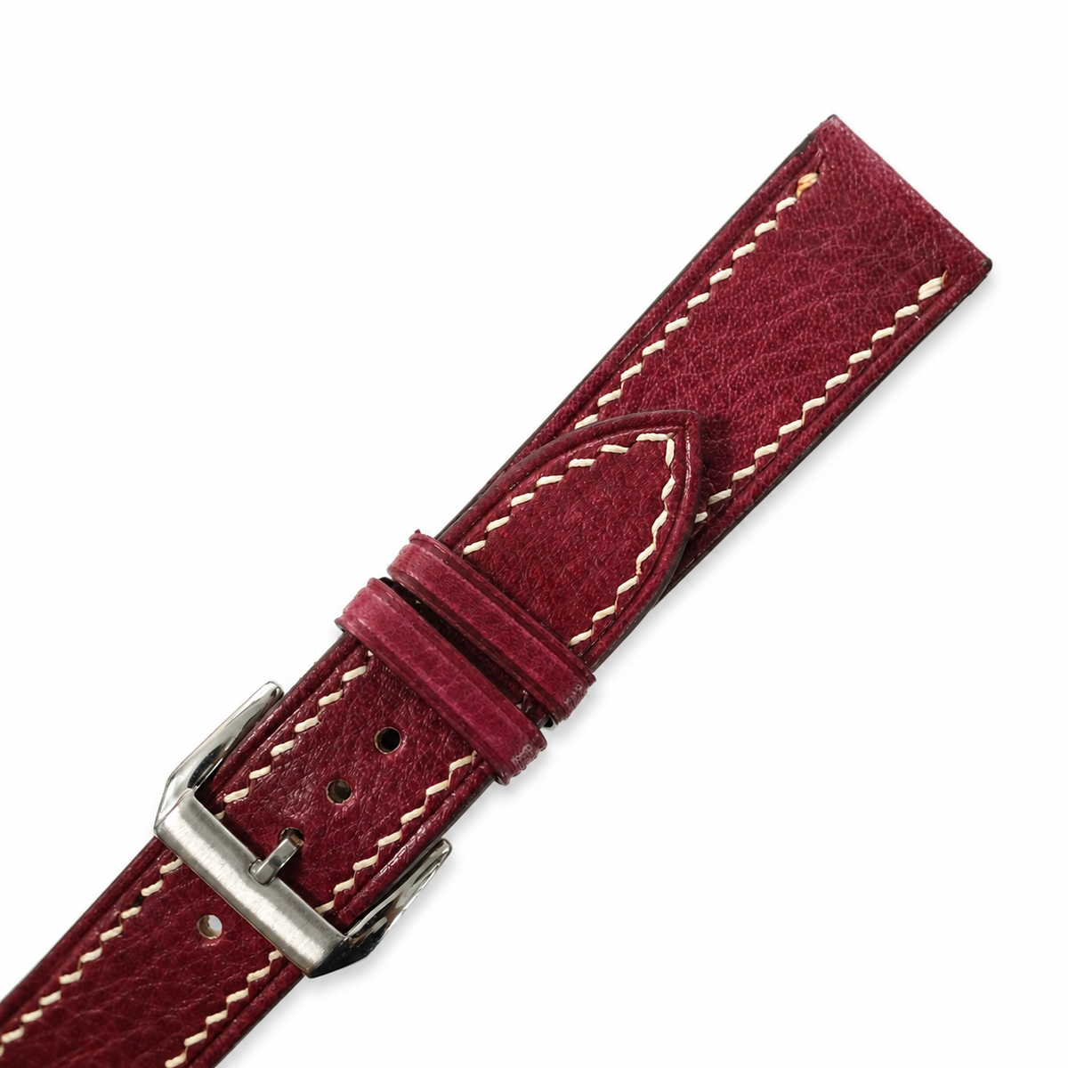 Burgundy red Italian leather watch strap, close-up of the hand stitching and keeper