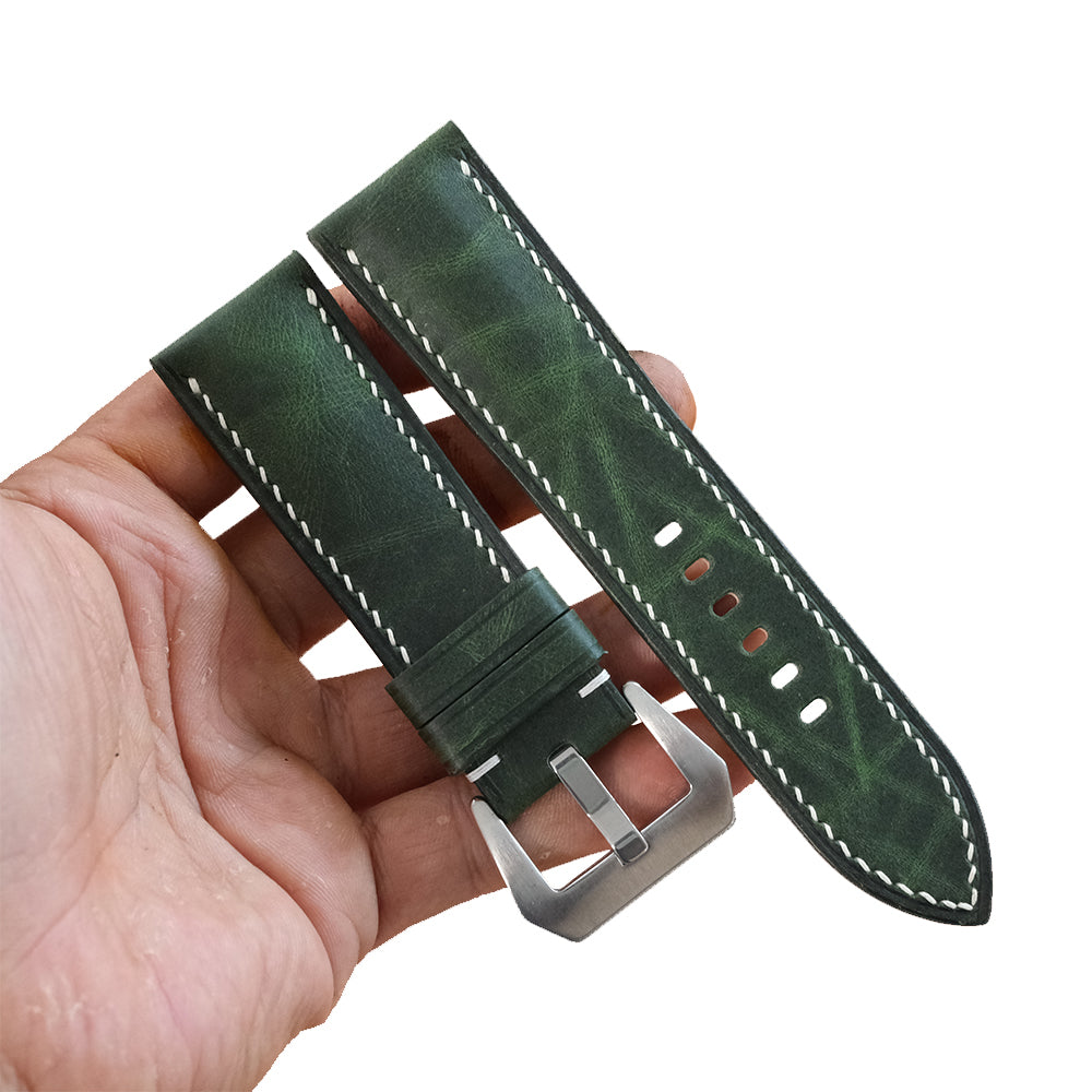 Green Waxed leather watch strap in hand