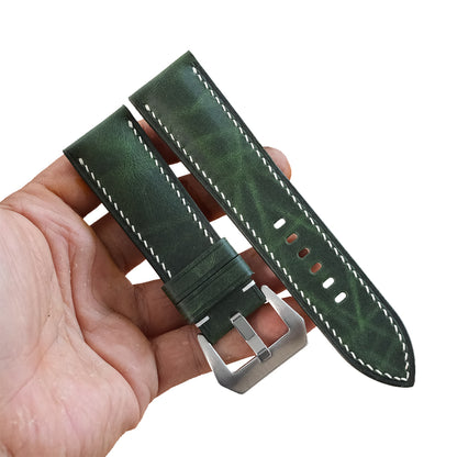 Green Waxed leather watch strap in hand