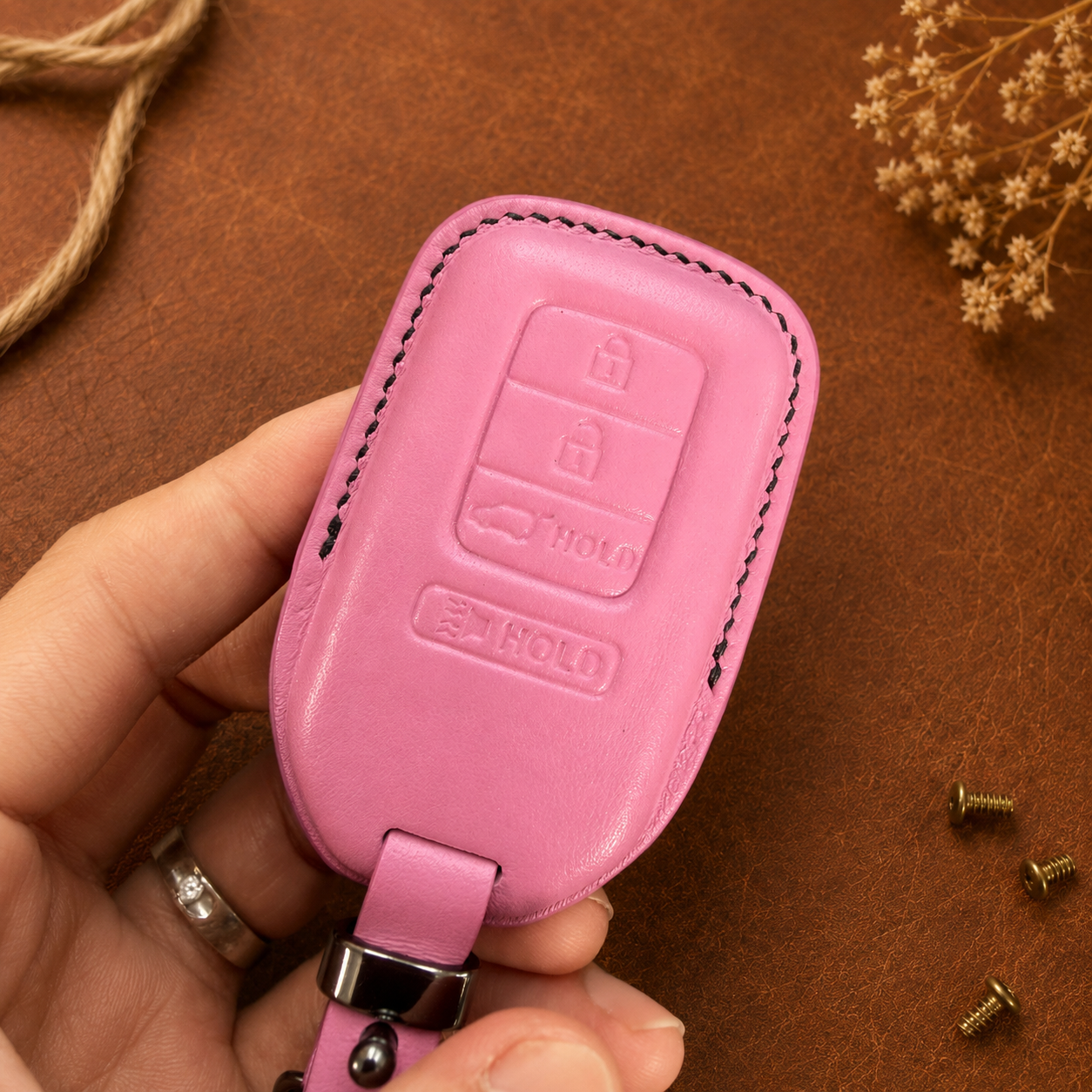 Honda CR-V leather smart key cover held in hand