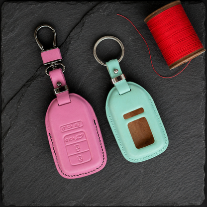 Honda CR-V leather key fob covers - pink and turquoise