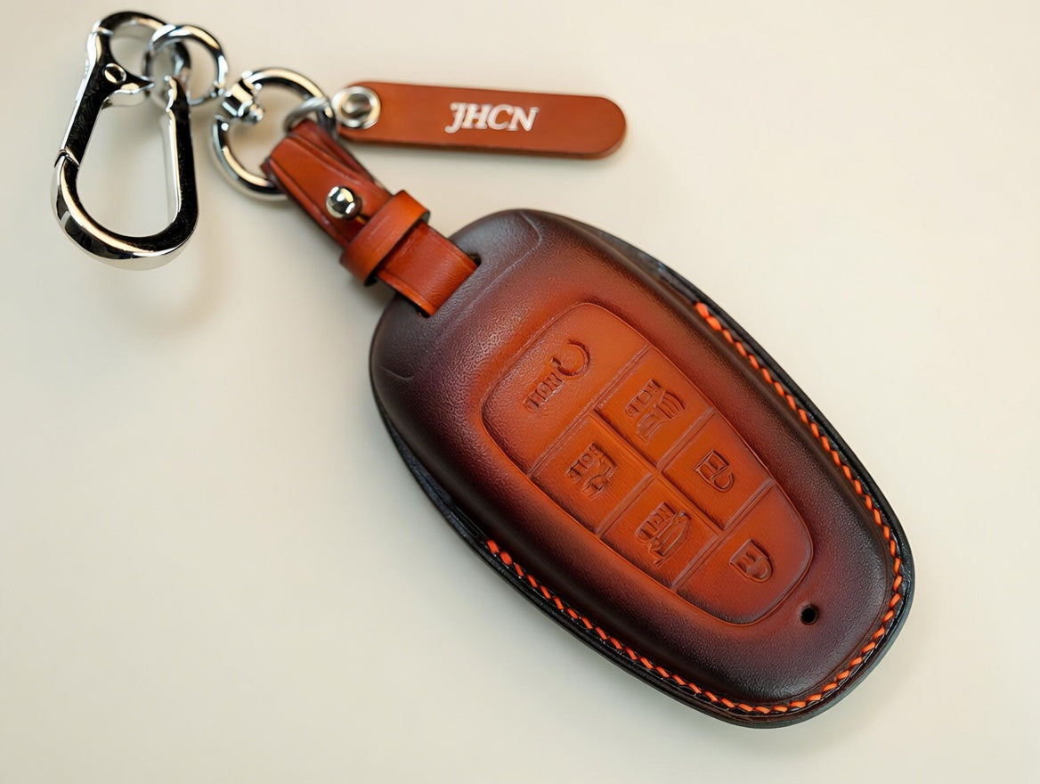Hyundai Palisade Tucson leather key fob cover — patina brown with personalized JHCN tag