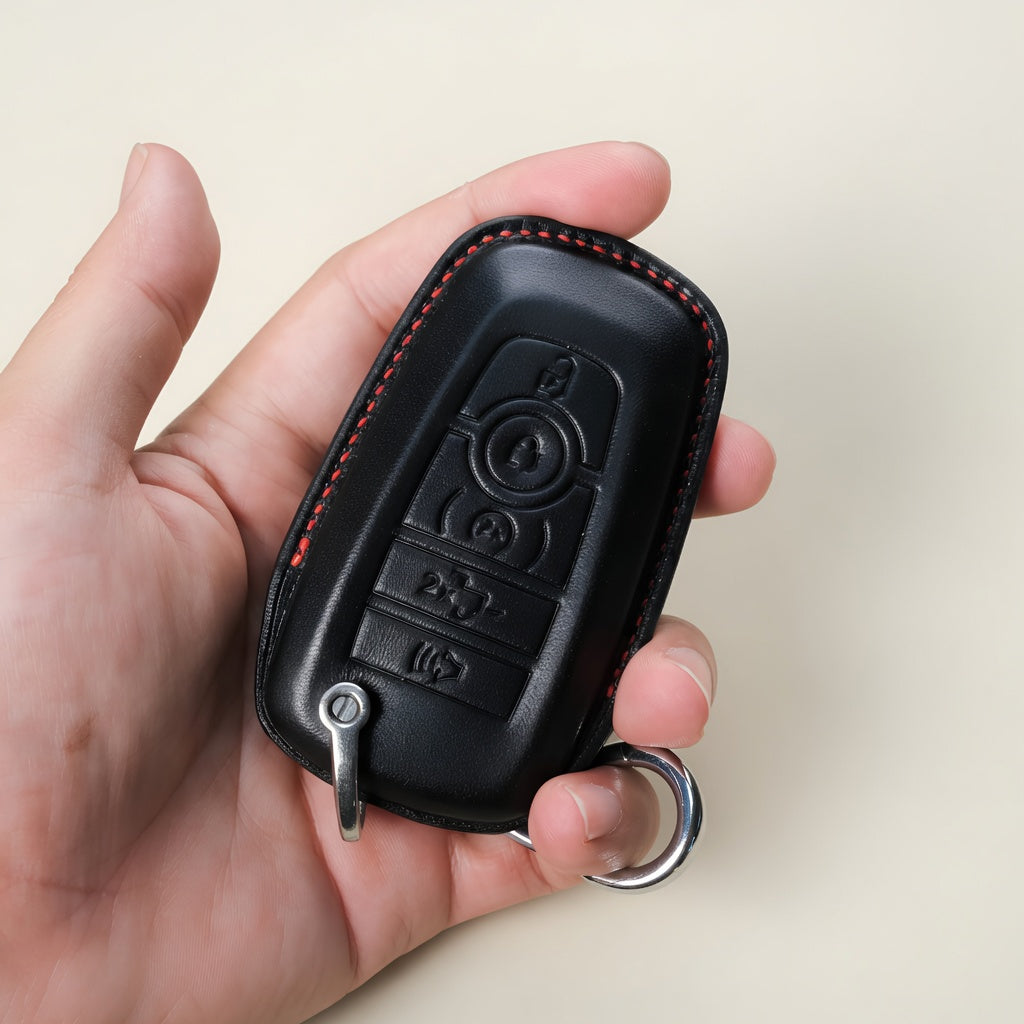 Ford Mustang leather key fob in hand — 5-button front layout