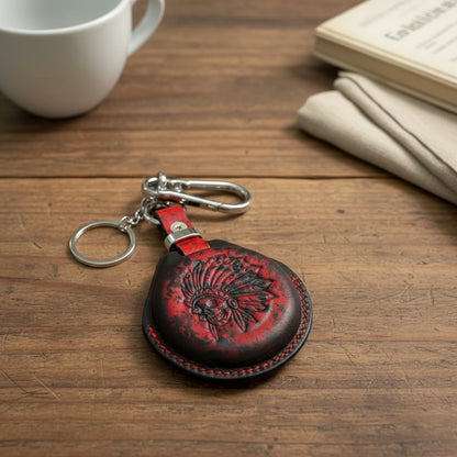 Handmade Indian Chief leather key fob cover - flat lay on wood