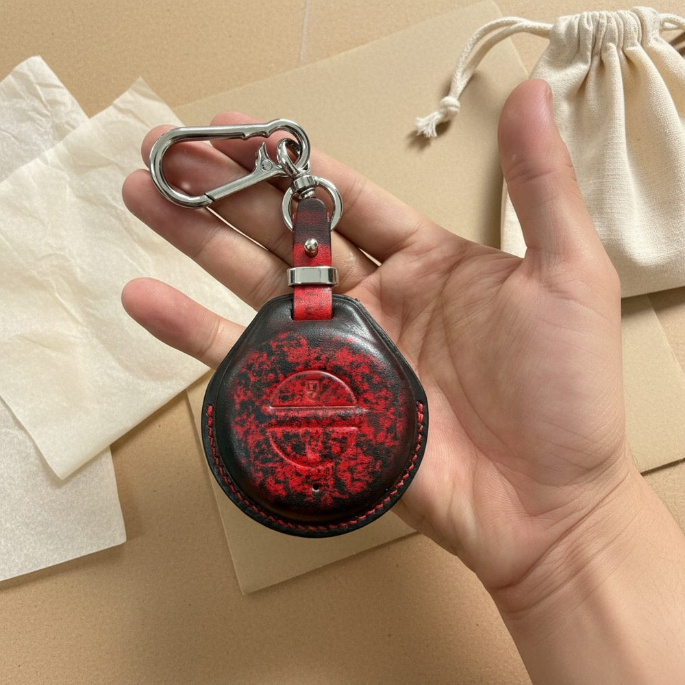 Indian Chief leather key fob cover back held in hand