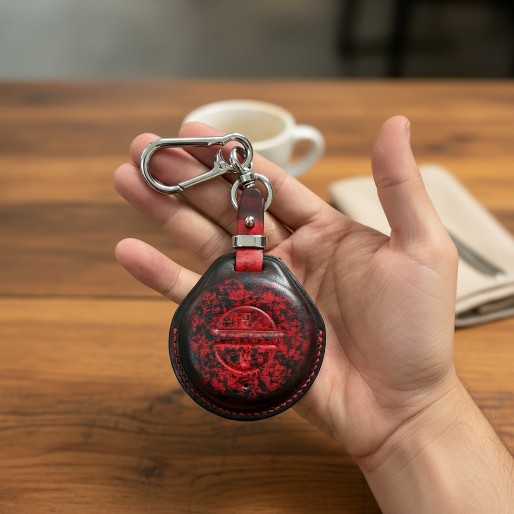Indian Chief keyless fob leather cover held in hand