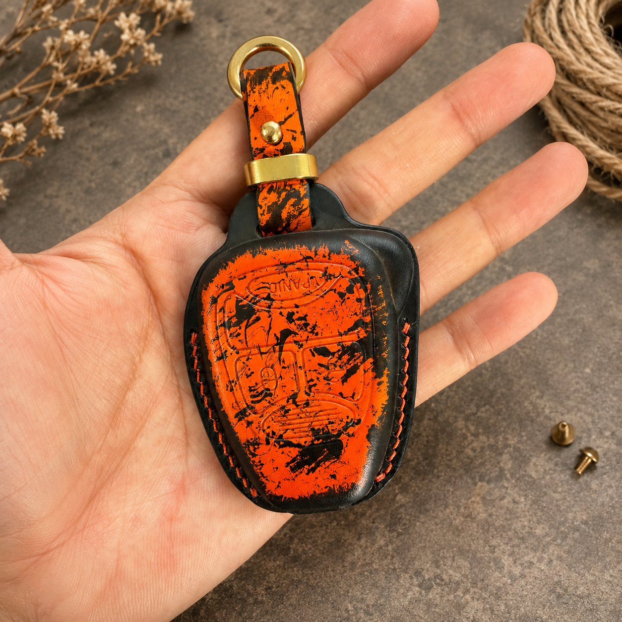 Jeep Grand Cherokee leather key fob cover held in hand