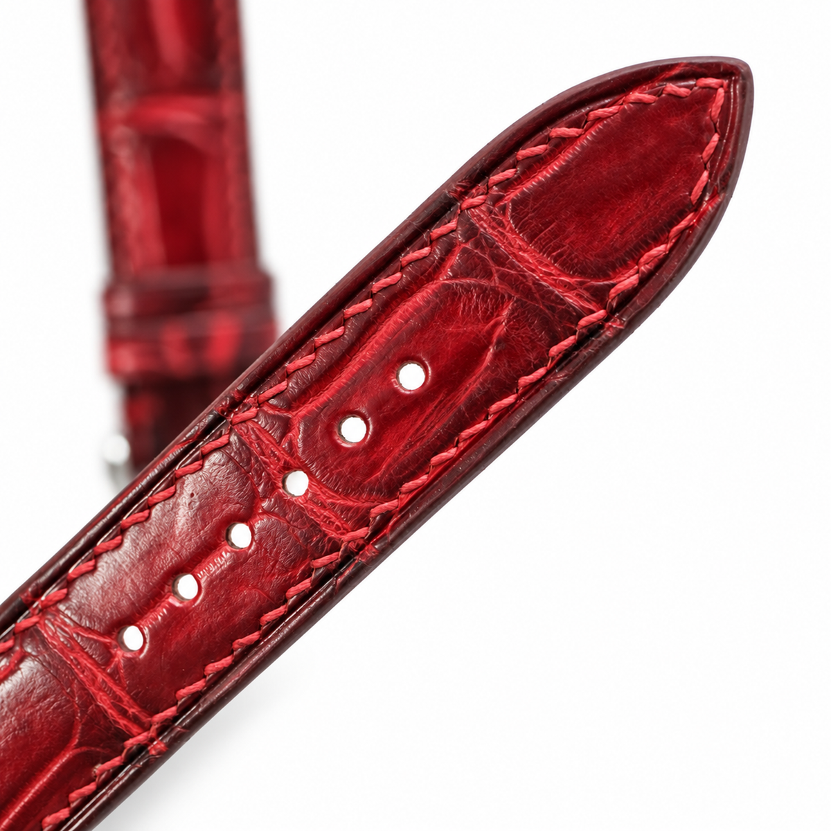 Red Bordeaux Patina Alligator strap macro tip and sizing holes